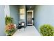Inviting entryway with stylish decor, potted plants, and a welcoming front door at 2789 Pleasant Cypress Cir, Kissimmee, FL 34741