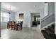Bright dining room showcasing tiled floors and easy access to the living area at 283 Willow View Dr, Davenport, FL 33896