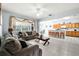 Spacious living area with an open layout, seamlessly connecting to the breakfast bar and kitchen at 283 Willow View Dr, Davenport, FL 33896