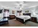 Spacious main bedroom with comfortable seating area and warm natural light at 283 Willow View Dr, Davenport, FL 33896