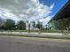 Urban setting with a glimpse of modern architecture, green spaces, and city skyline at 304 E South St # 5020, Orlando, FL 32801