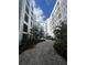 Beautiful courtyard featuring lush landscaping, pavers, and elegant architecture offering a serene escape at 304 E South St # 5020, Orlando, FL 32801