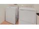 Convenient laundry room equipped with a modern washer and dryer at 306 Alexandrite St, Deland, FL 32720