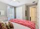Cozy bedroom with soft lighting, a comfortable bed, and a serene ambiance at 307 Bella Cortina Dr, Kissimmee, FL 34759