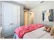 Inviting bedroom with a comfortable bed, stylish decor, and a relaxing atmosphere at 307 Bella Cortina Dr, Kissimmee, FL 34759