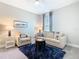 Cozy living room with a plush rug and comfortable seating arrangement at 307 Bella Cortina Dr, Kissimmee, FL 34759