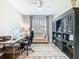 Bright home office space with modern furnishings and decorative shelving at 307 Bella Cortina Dr, Kissimmee, FL 34759