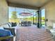 Inviting outdoor patio with comfortable seating, scenic views, and a relaxing ambiance at 307 Bella Cortina Dr, Kissimmee, FL 34759