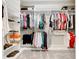 Bright walk-in closet with ample shelving and hanging space for organized storage at 307 Bella Cortina Dr, Kissimmee, FL 34759