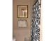 Cozy bathroom featuring decorative shower curtain, palm tree art, and fresh, folded towels at 3100 Parkway Blvd # 113, Kissimmee, FL 34747