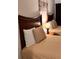 Inviting bedroom featuring two beds, ambient lighting, and calming decor at 3100 Parkway Blvd # 113, Kissimmee, FL 34747
