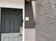 A close-up of the front door with visible unit number and entry details at 3100 Parkway Blvd # 113, Kissimmee, FL 34747
