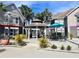 Community gazebo and outdoor seating area featuring mature landscaping at 3100 Parkway Blvd # 113, Kissimmee, FL 34747