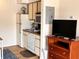 Efficient kitchenette features essential appliances and modern design elements at 3100 Parkway Blvd # 113, Kissimmee, FL 34747