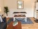 The living room features a view of dining table and chairs on a decorative rug at 3100 Parkway Blvd # 113, Kissimmee, FL 34747