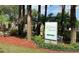 Parkway Palms Resort directional sign amidst lush greenery and palm trees at 3100 Parkway Blvd # 113, Kissimmee, FL 34747