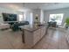 Open kitchen and dining area, great for entertaining Gathering and friends at 3173 Armstrong Spring Dr, Kissimmee, FL 34744