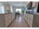 Bright kitchen featuring stainless steel appliances and granite countertops, with an adjacent dining area at 3173 Armstrong Spring Dr, Kissimmee, FL 34744