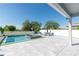Inviting pool and patio area perfect for relaxing and entertaining outdoors at 3173 Armstrong Spring Dr, Kissimmee, FL 34744