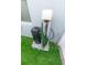 Image of home water softener on artificial turf grass and protective rock base at 3173 Armstrong Spring Dr, Kissimmee, FL 34744
