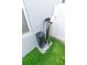 Image of water softener for home with protective rocks and artificial turf grass at 3173 Armstrong Spring Dr, Kissimmee, FL 34744