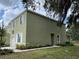 Charming two-story home with well-maintained lawn and complementary landscaping at 4247 Shackelford Ct, Orlando, FL 32824