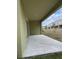A covered patio space providing an outdoor area for relaxation and entertainment at 4247 Shackelford Ct, Orlando, FL 32824