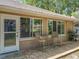 Back of house with a patio area perfect for outdoor dining and relaxation at 4907 Raylene Way, St Cloud, FL 34771