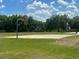 Community basketball court with hoop ready for recreation and outdoor sports activities at 4907 Raylene Way, St Cloud, FL 34771