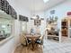 Cozy dining area with tiled floors, natural lighting, and rustic decor at 4907 Raylene Way, St Cloud, FL 34771