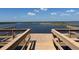 Scenic view from a wooden pier offers tranquil water views and relaxing waterfront atmosphere at 4907 Raylene Way, St Cloud, FL 34771
