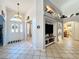 Inviting foyer with tiled floor and views into other rooms at 4907 Raylene Way, St Cloud, FL 34771
