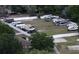 Aerial view of a secure RV and trailer storage facility, providing ample parking and fenced perimeter at 4907 Raylene Way, St Cloud, FL 34771