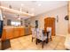 Well-lit kitchen with wooden cabinets, eat in area and stainless steel appliances at 4910 Culdesac Ct St, St Cloud, FL 34772