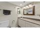 Bright bathroom with granite countertops, modern fixtures, and ample storage at 5316 Burning Tree Dr # A09-2, Orlando, FL 32811
