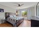 Comfortable bedroom with a natural light and a ceiling fan at 5316 Burning Tree Dr # A09-2, Orlando, FL 32811