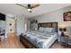 Well-lit main bedroom featuring a ceiling fan, and private bathroom at 5316 Burning Tree Dr # A09-2, Orlando, FL 32811