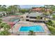 A nice view of the community pool and tennis courts, perfect for recreation at 5316 Burning Tree Dr # A09-2, Orlando, FL 32811