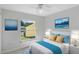 Bright bedroom with white walls and a beautiful outdoor view from a large window at 5524 Loma Vista, Davenport, FL 33896