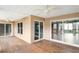 Spacious outdoor deck with wood flooring and sliding glass doors at 5524 Loma Vista, Davenport, FL 33896