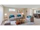 Inviting living room features neutral tones, plush seating, and natural light at 5524 Loma Vista, Davenport, FL 33896