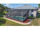 Backyard pool with a screened enclosure allowing for year-round enjoyment and protection at 5524 Loma Vista, Davenport, FL 33896