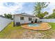 Spacious fenced yard with brick lined mulch at 7629 Marietta St, Orlando, FL 32807