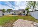 Backyard with fenced yard, patio area, and room for outdoor activities at 7629 Marietta St, Orlando, FL 32807