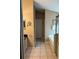 Bathroom featuring a bathtub and a walk-in shower, complemented by neutral color tones and tiled floors at 8074 Santee Dr, Kissimmee, FL 34747