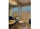 Standard bathroom with tub, shower, toilet, and vanity, featuring tiled walls and ample lighting at 8074 Santee Dr, Kissimmee, FL 34747