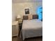 Comfortable bedroom with a clean and cozy decor at 8074 Santee Dr, Kissimmee, FL 34747