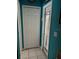Hallway entrance featuring a closet and exterior door with tiled floor at 8074 Santee Dr, Kissimmee, FL 34747