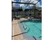 Sparkling pool and spa featuring easy access steps and ample patio space at 8074 Santee Dr, Kissimmee, FL 34747
