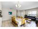 Comfortable dining area with tile floors and a neutral color scheme at 814 Bloomingdale Dr, Davenport, FL 33897